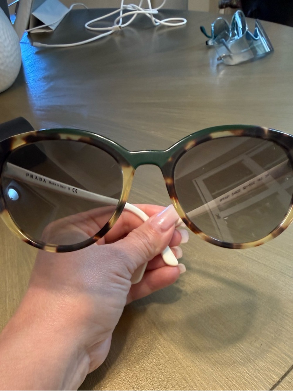 Prada Tortoiseshell Sunglasses with Green Bridge